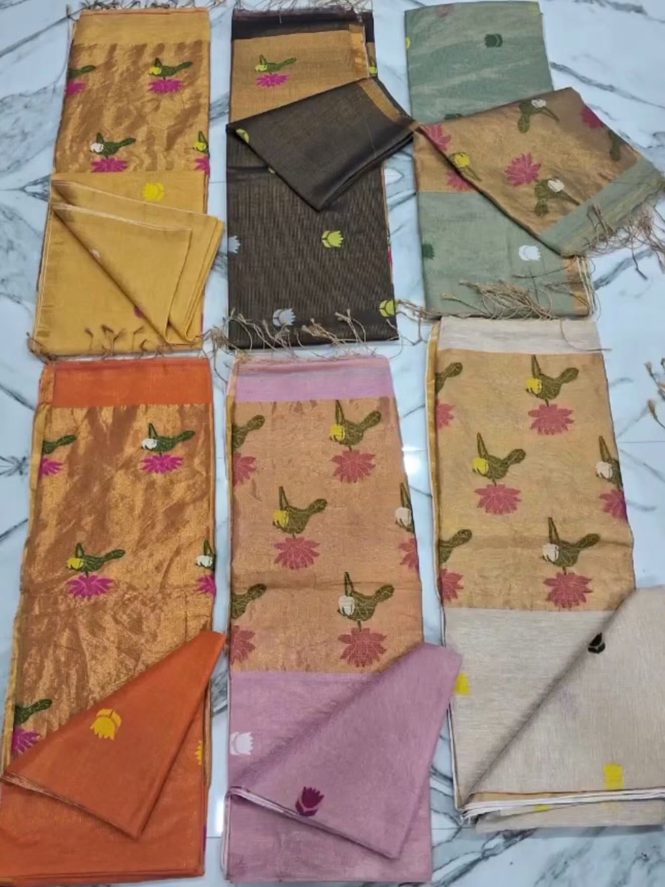 Linen tissue sarees with jamdani weaving