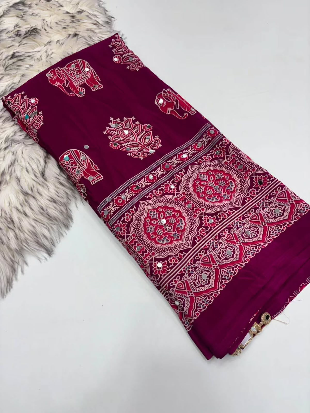 Fancy ajrakh crepe silk sarees with mirrors allover