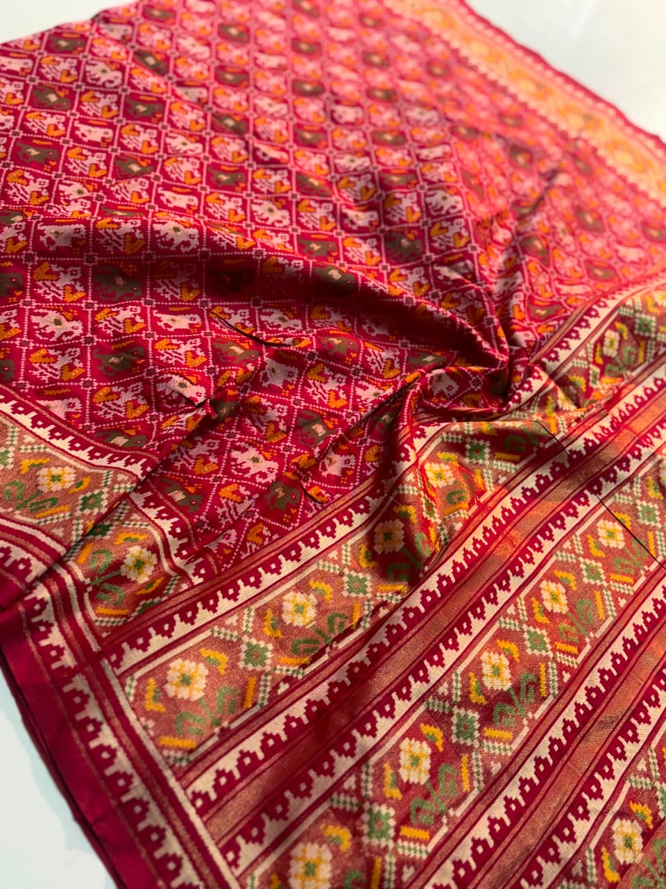 Semi patan patola ikkat silk sarees with tissue borders