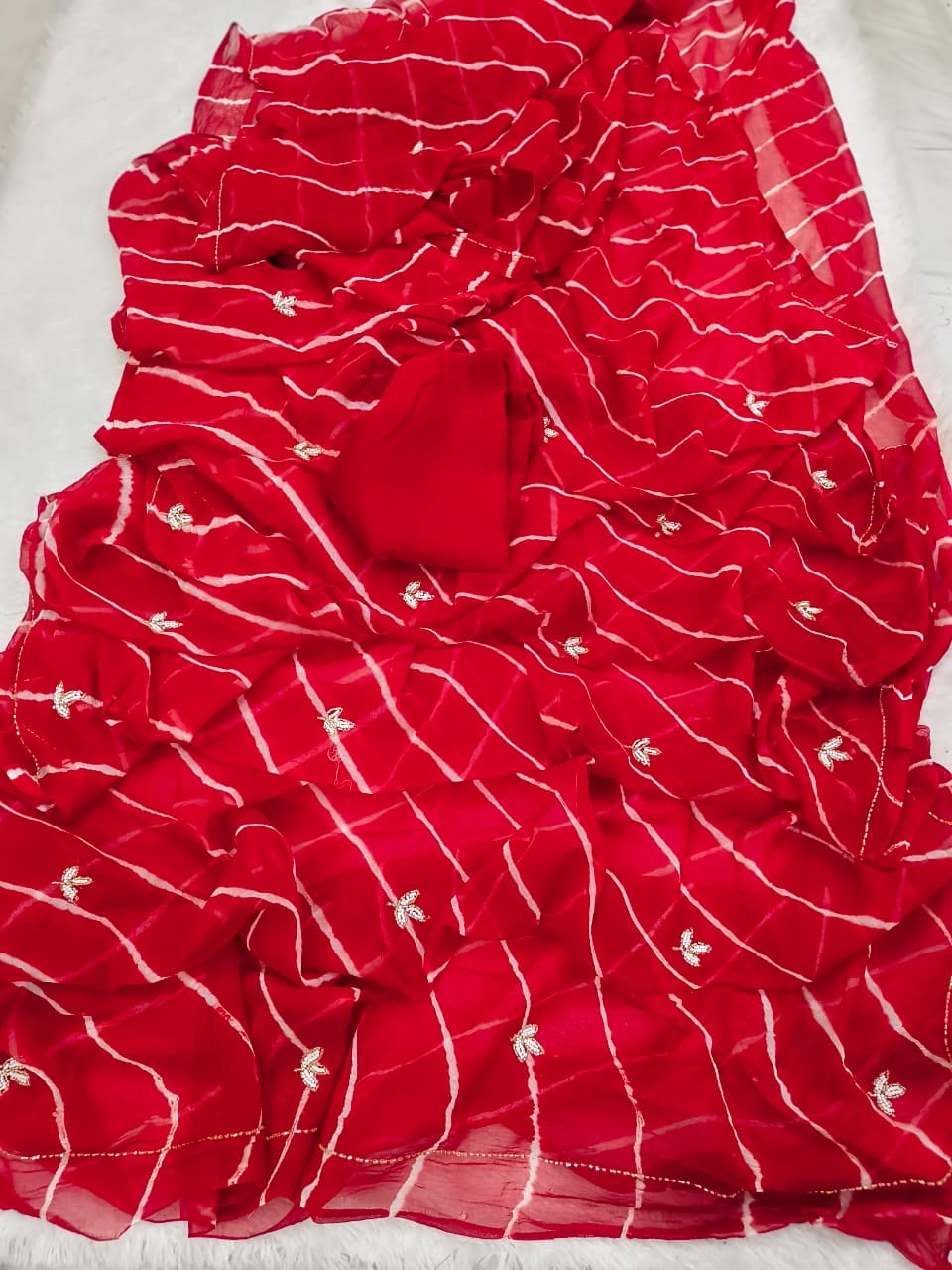 Chiffon lehariya sarees with handwork unstitched blouse