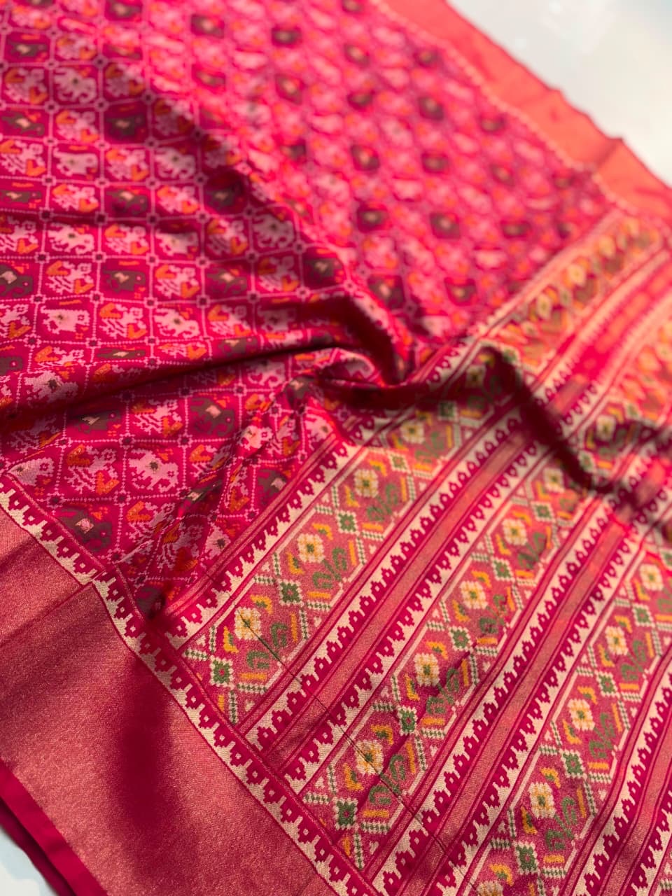 Semi patan patola ikkat silk sarees with tissue borders
