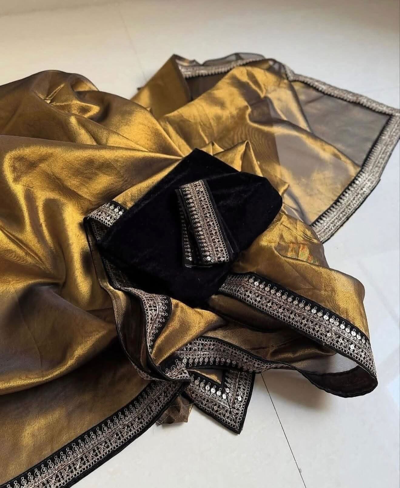 Exclusive banaras tissue silk saree with rich borders and velvet blouse