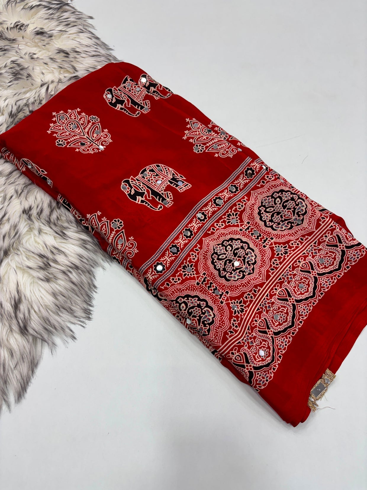 Fancy ajrakh crepe silk sarees with mirrors allover