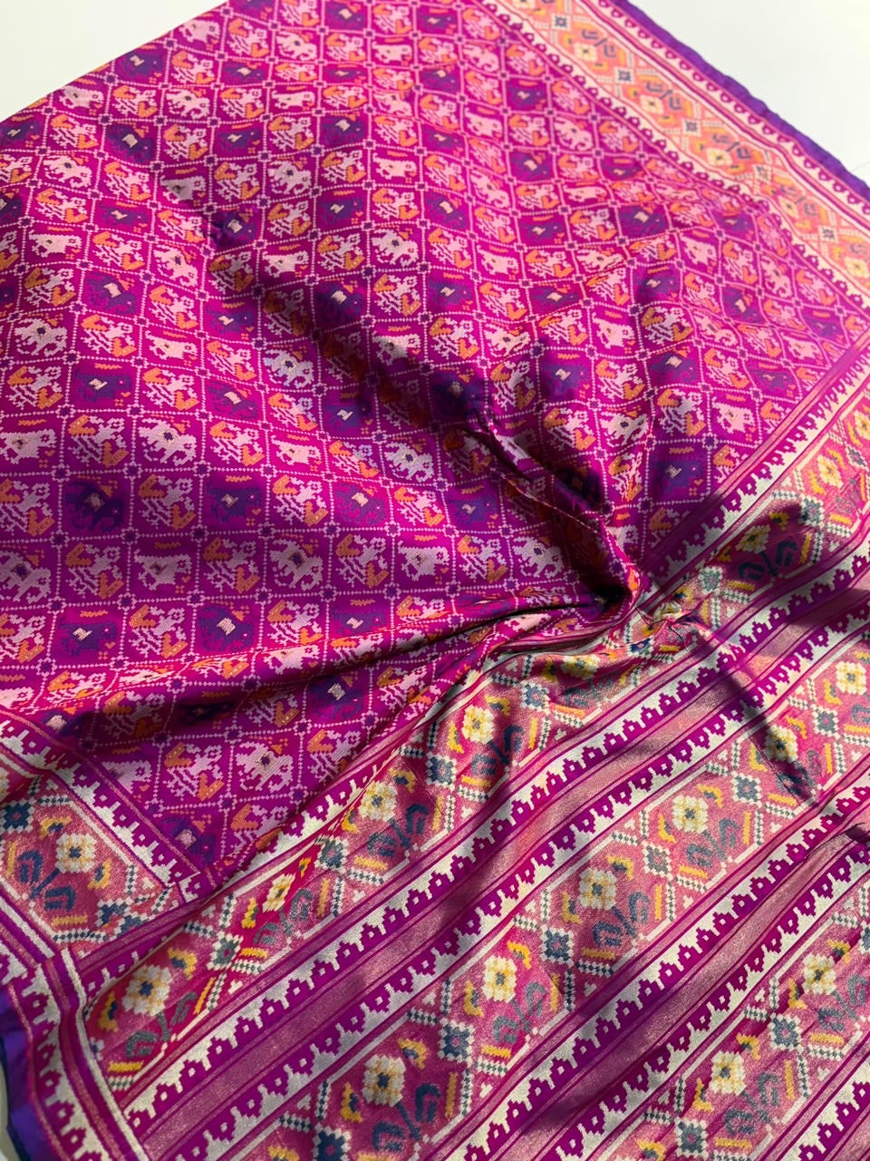 Semi patan patola ikkat silk sarees with tissue borders