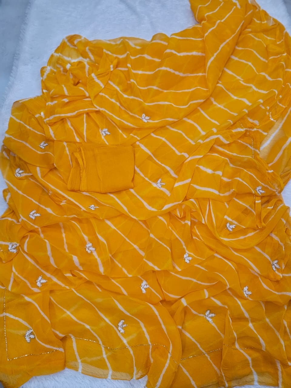 Chiffon lehariya sarees with handwork unstitched blouse