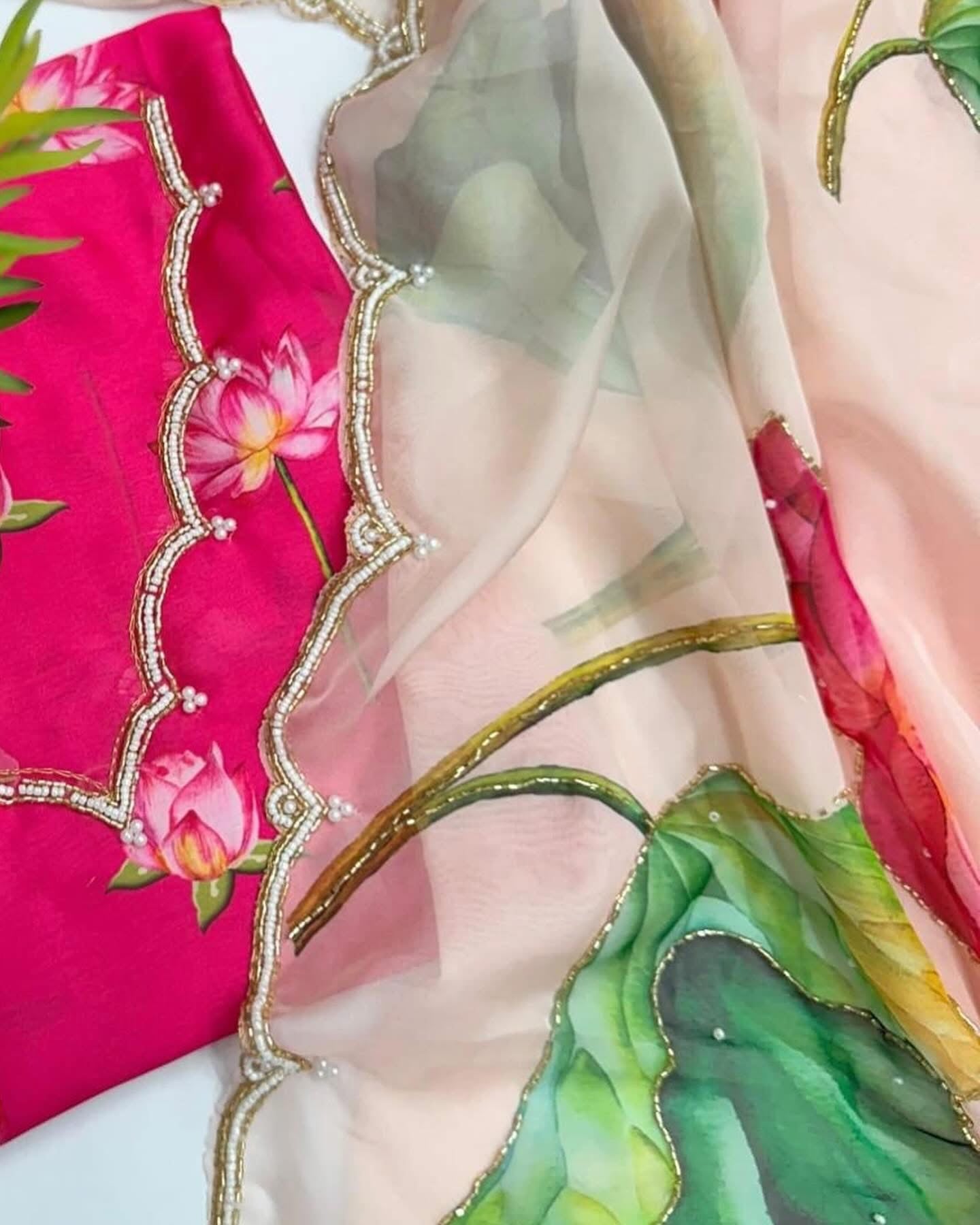 Floral soft and falling organza saree with handwork scalloped borders and rich blouse