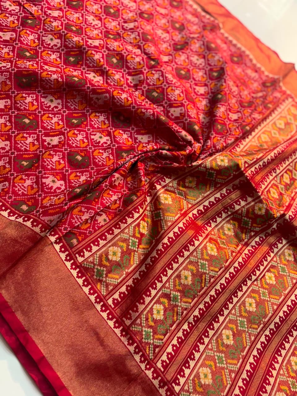 Semi patan patola ikkat silk sarees with tissue borders