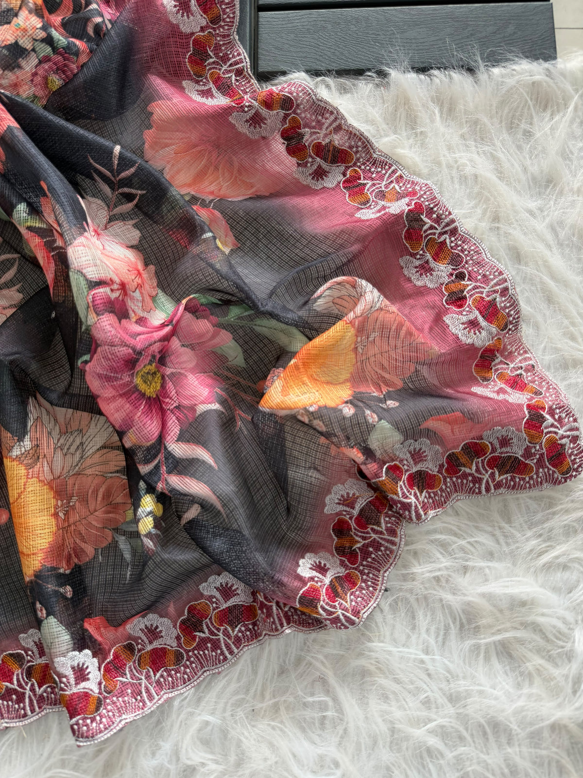 Floral kota sarees with scalloped intricate embroidery and unstitched blouse
