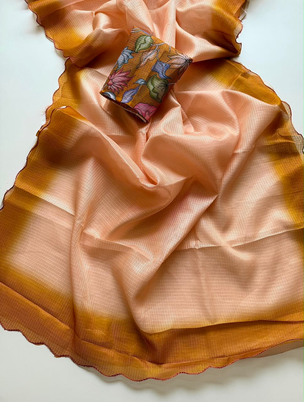 Shaded kota sarees with scalloped borders and kalamkari unstitched blouse