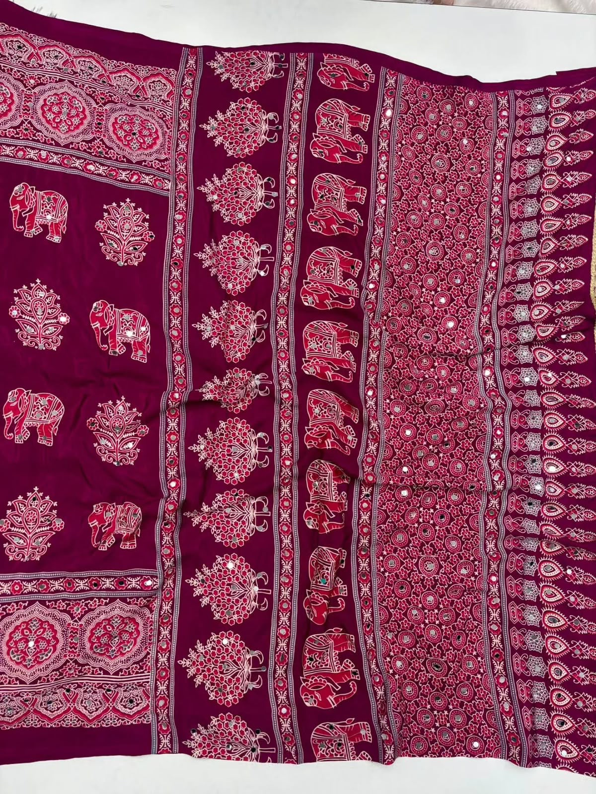 Fancy ajrakh crepe silk sarees with mirrors allover