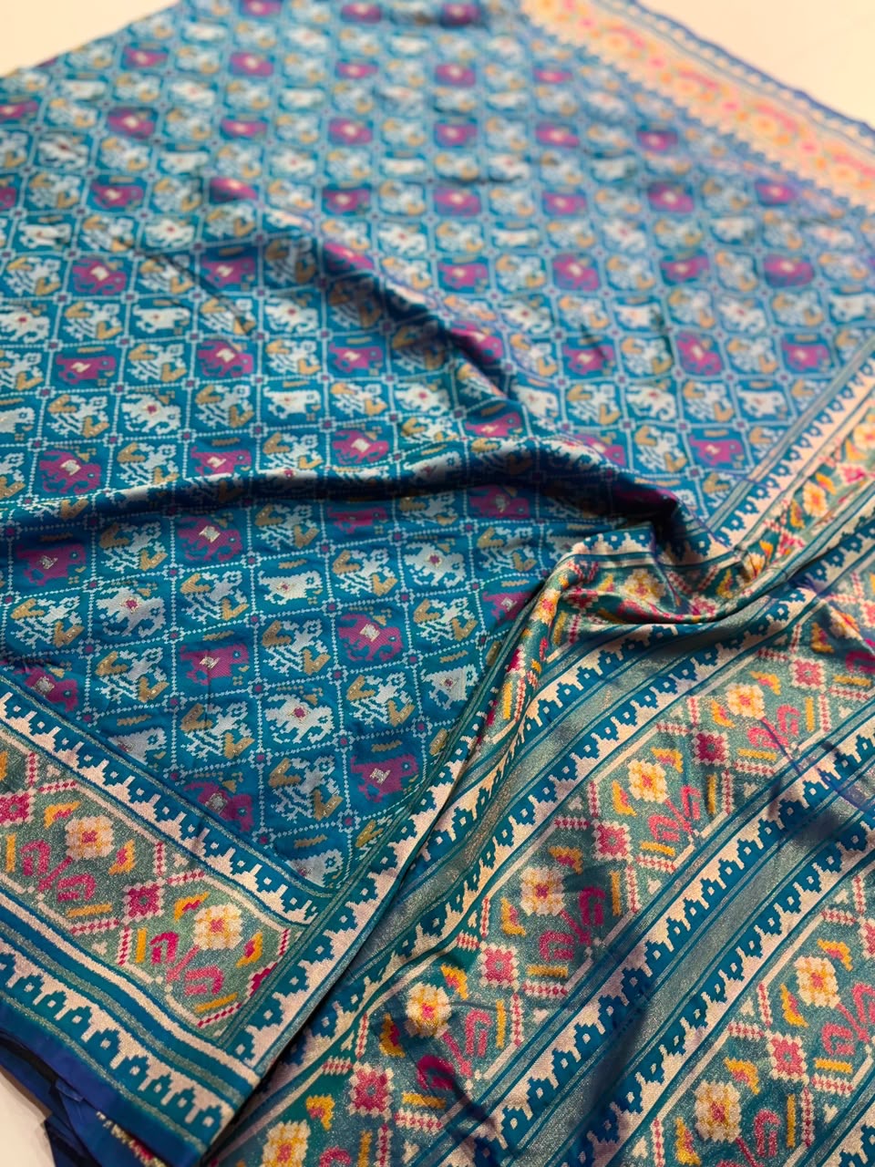 Semi patan patola ikkat silk sarees with tissue borders