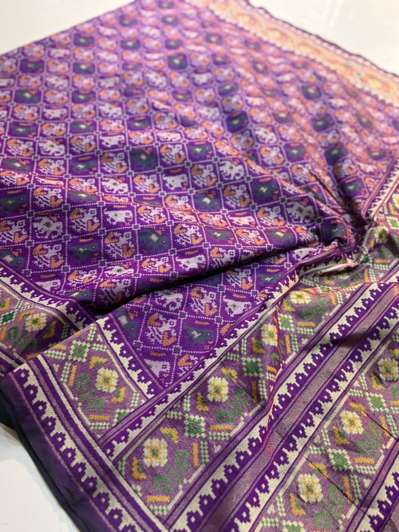 Semi patan patola ikkat silk sarees with tissue borders