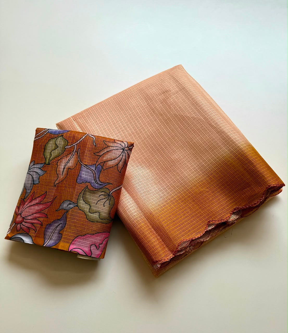 Shaded kota sarees with scalloped borders and kalamkari unstitched blouse