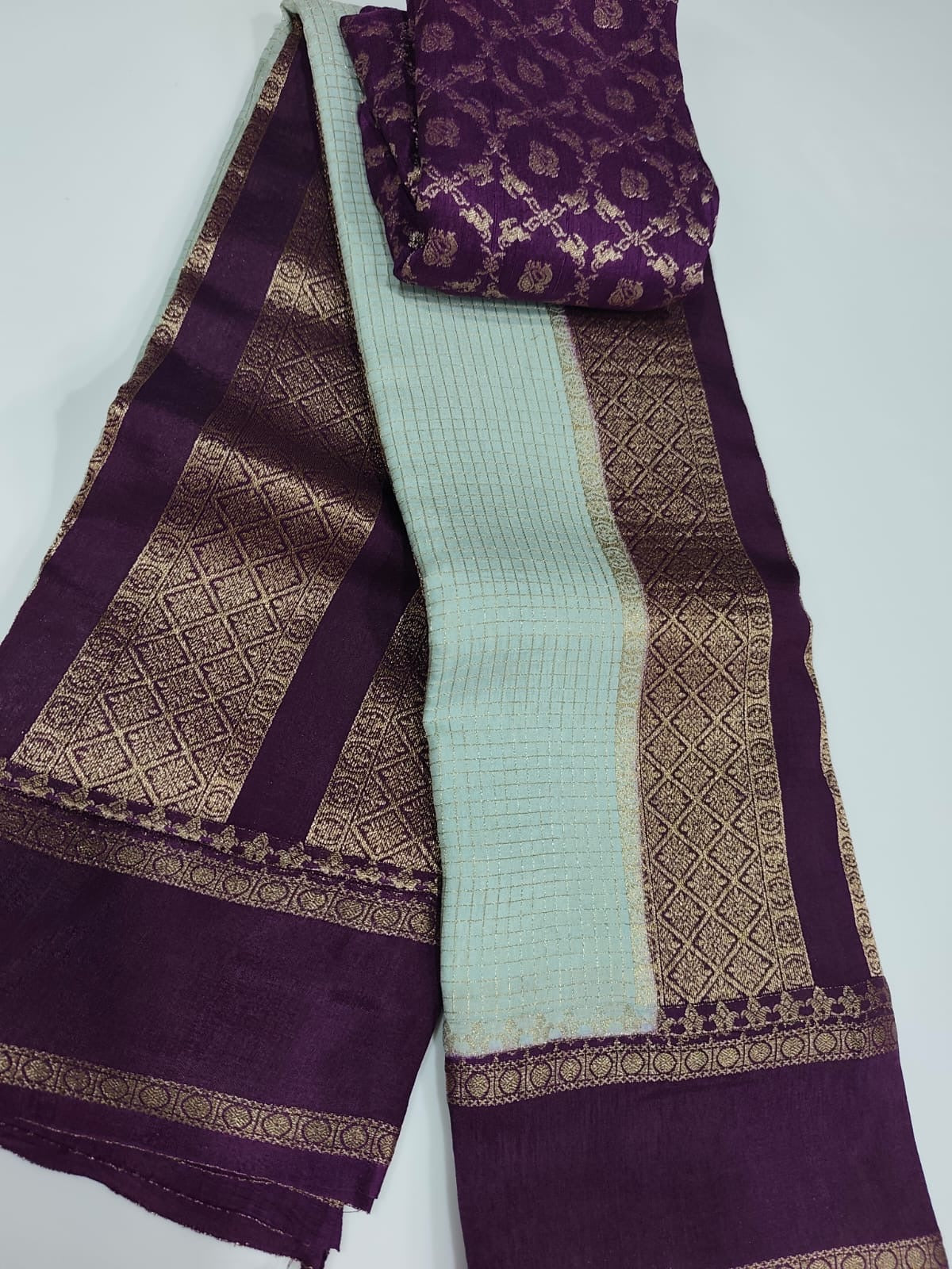 Exclusive banaras crepe silk sarees with checkered weaving gap borders and rich unstitched banaras blouse
