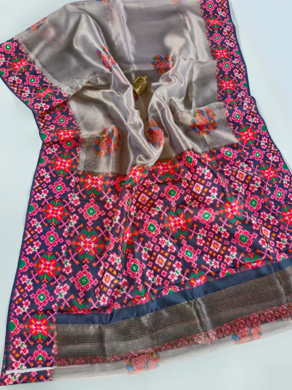 Exclusive tissue silk sarees with patola borders pallu and blouse