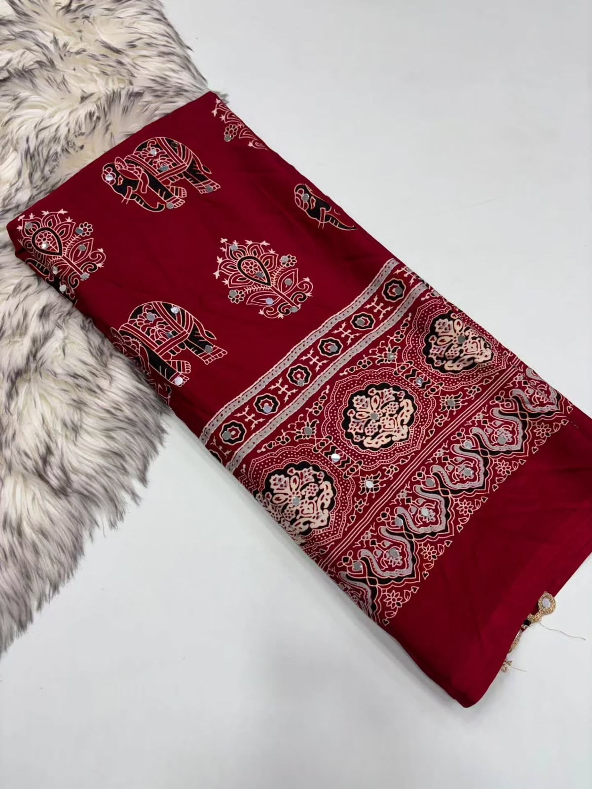 Fancy ajrakh crepe silk sarees with mirrors allover