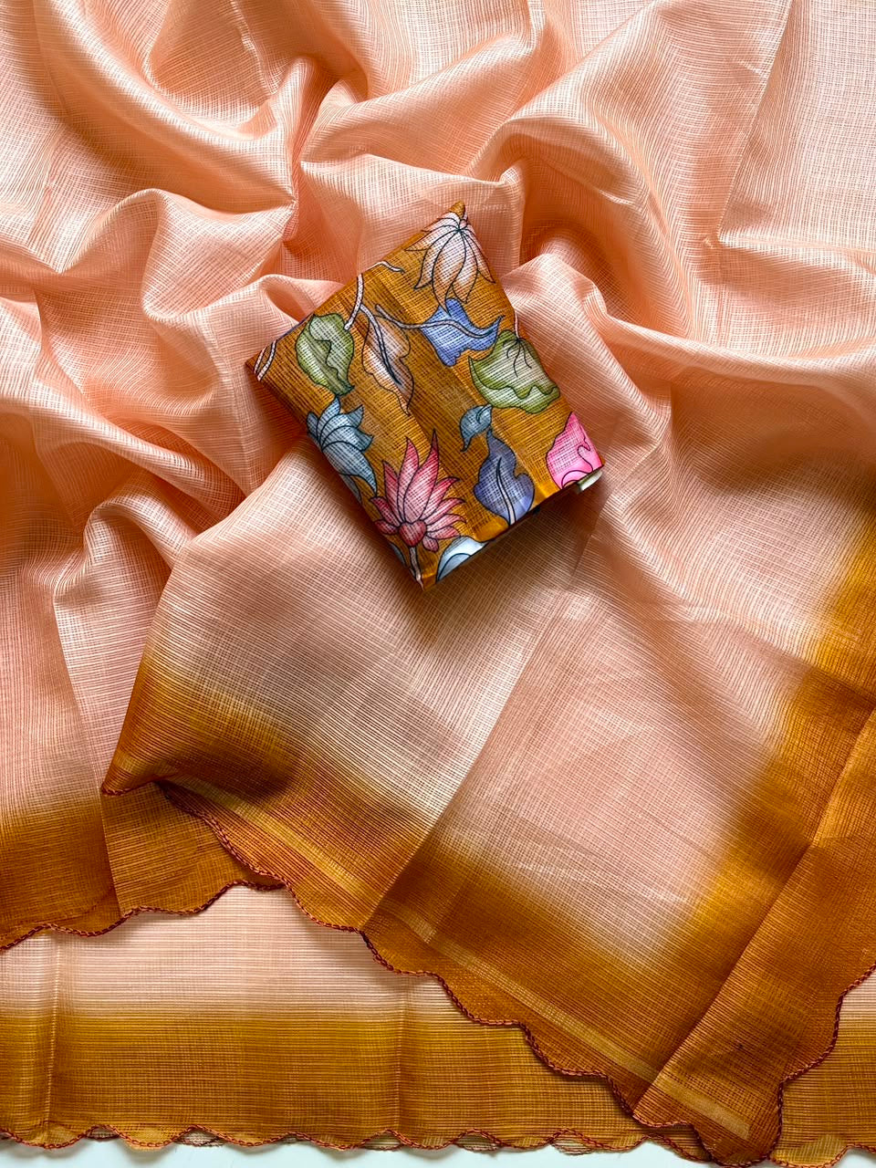Shaded kota sarees with scalloped borders and kalamkari unstitched blouse