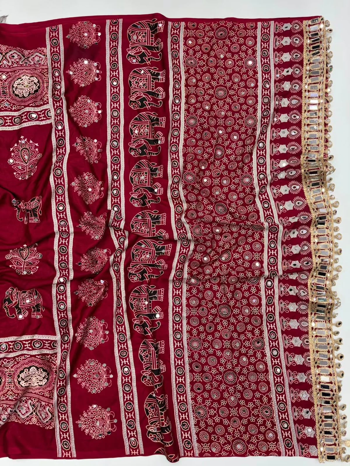 Fancy ajrakh crepe silk sarees with mirrors allover
