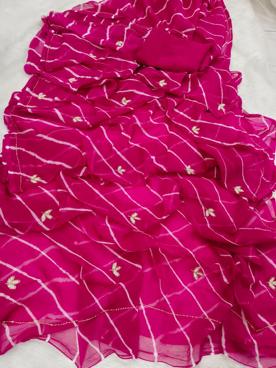 Chiffon lehariya sarees with handwork unstitched blouse