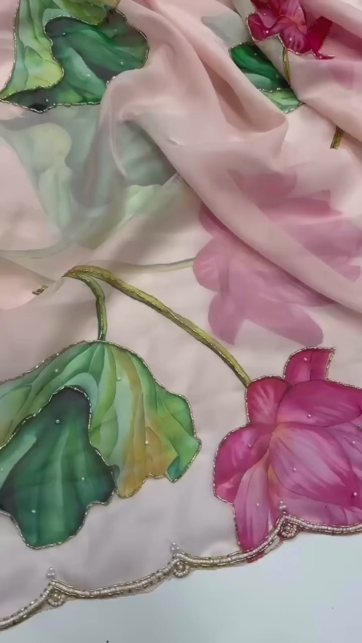 Floral soft and falling organza saree with handwork scalloped borders and rich blouse